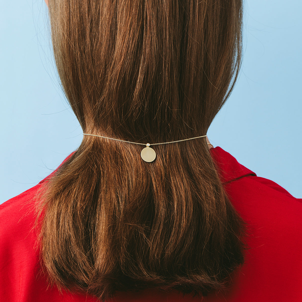 Round gold name necklace with diamond