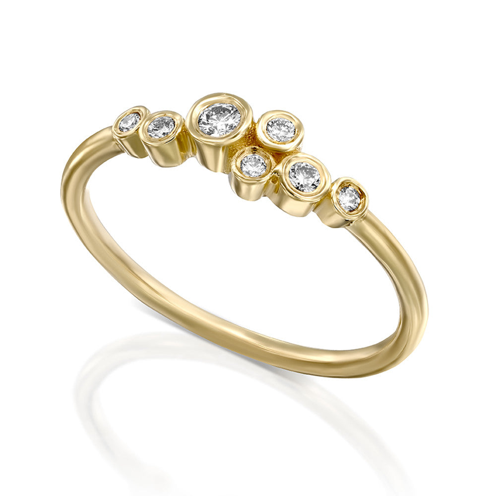 White diamond ring of varying sizes in a cup setting