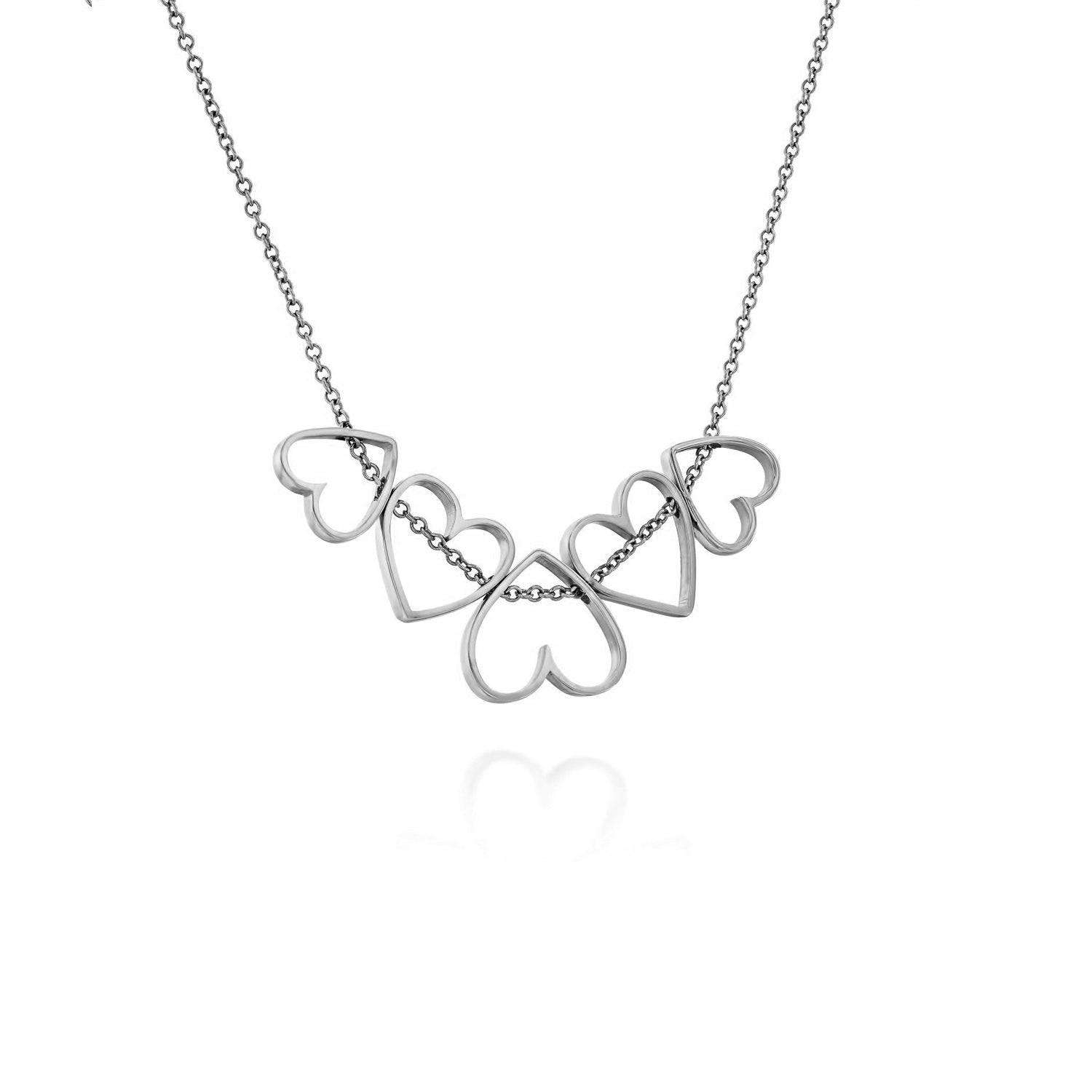 Gold heart necklace in varying sizes that move